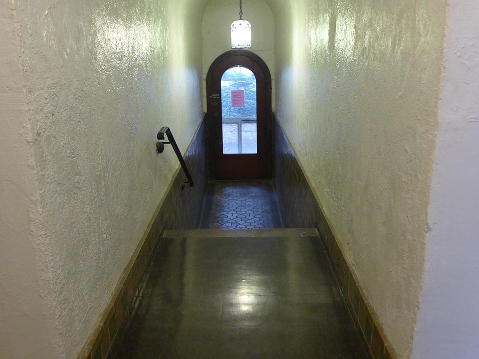 This door will take you to the building's private landscaped courtyard.