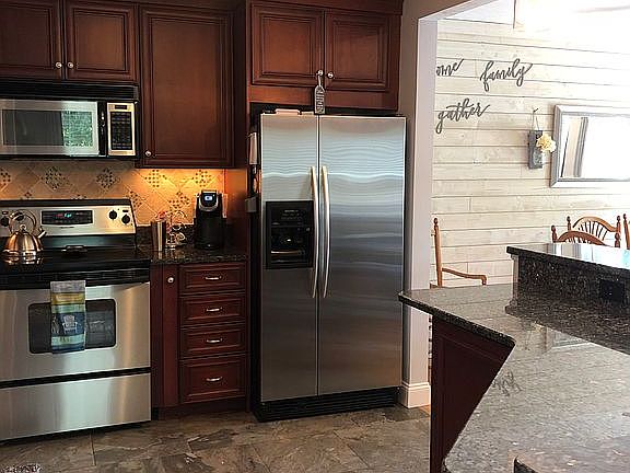 Cherry cabinets and slate fl
