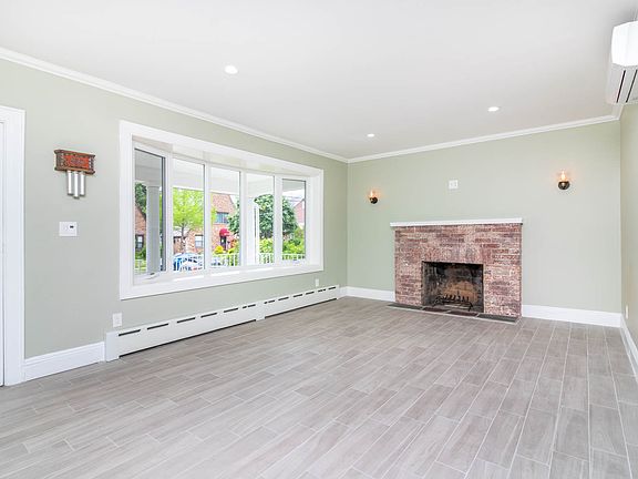 Great Warm Space with Wood Burning Fireplace. Bay Window!