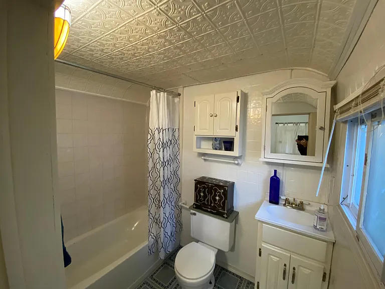 The first bedroom's attached bathroom.