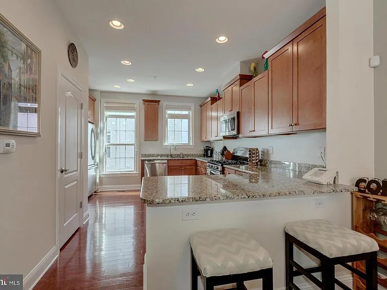 Open floor plan with bathrooms in all three levels