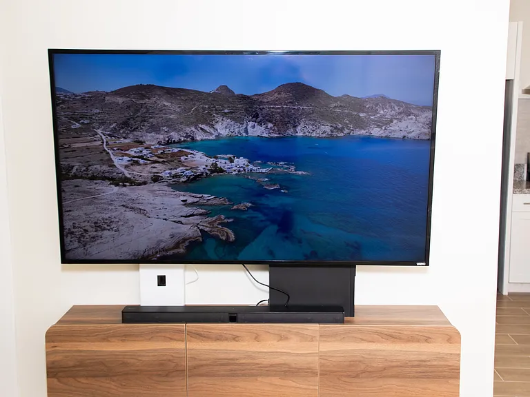 Vizio 65 inch Smart TV
Sony Surround System
Floating shelf