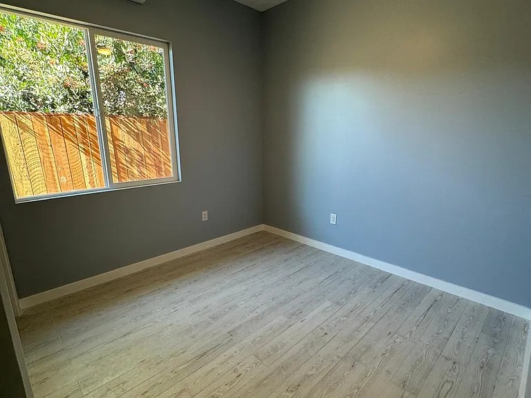 Bedrooms each have minisplit and closet. Ceiling fan changes light colors. 10' ceilings.