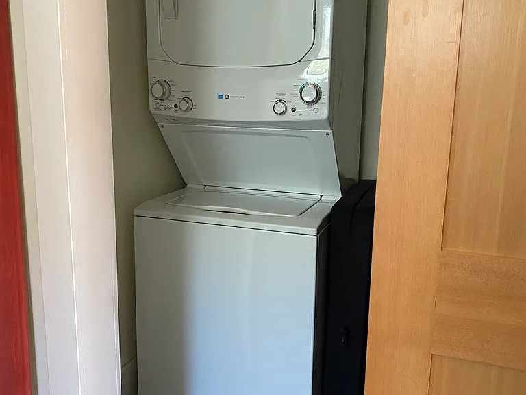 Stackable washer and dryer in unit