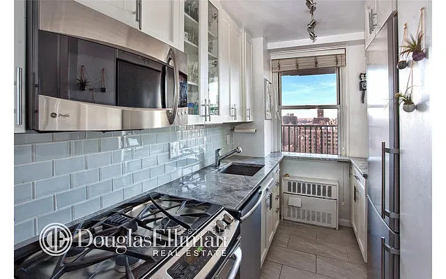 Sold by Douglas Elliman | media 9
