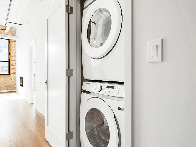 Full-size washer and dryer in the apartment.