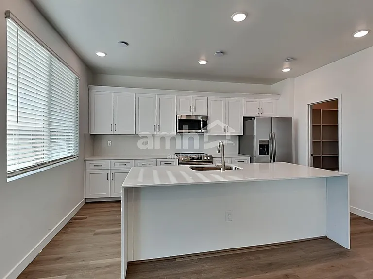 6971 N 125th Dr — Photo 4