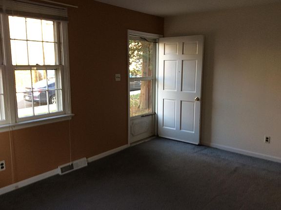 Living room looking at front entrance.