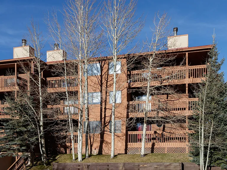 Condo building exterior, condo is ground floor corner unit
