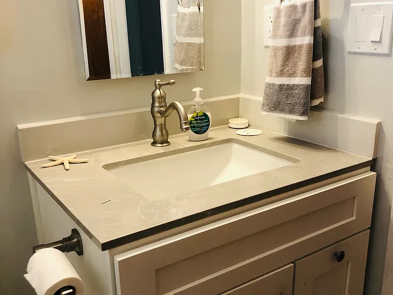 Newly refurbished 2nd bathroom. This bathroom has a bathtub.