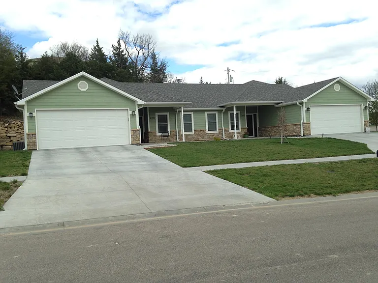 2104 is the unit to the right with 2 car garage and parking