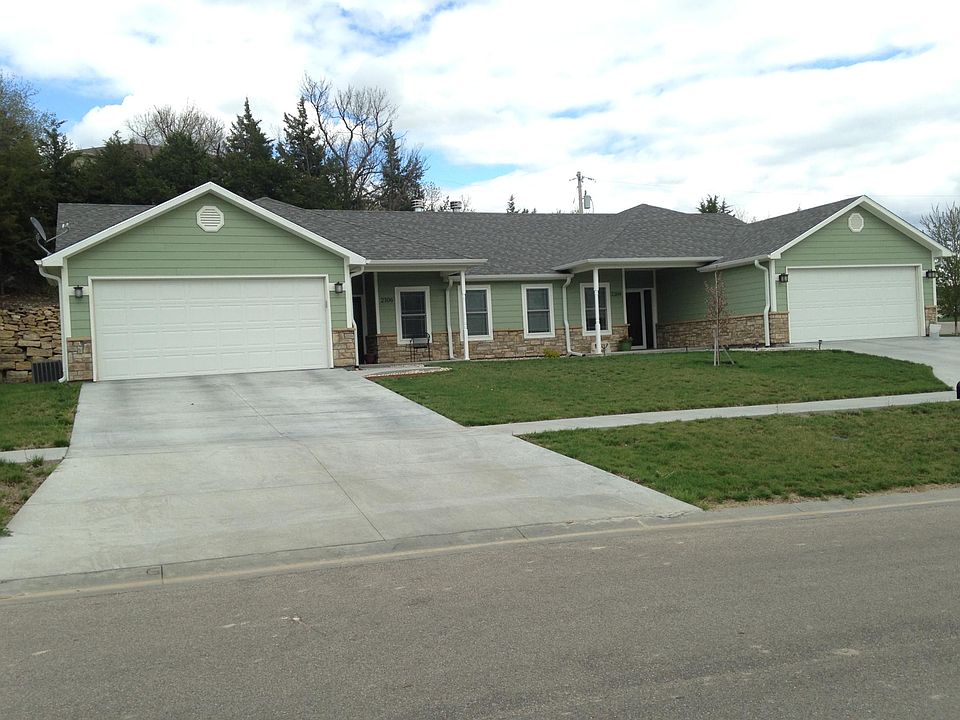 2104 is the unit to the right with 2 car garage and parking