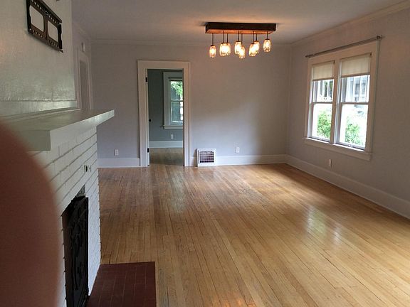 the main floor features a lving room and dining room combina