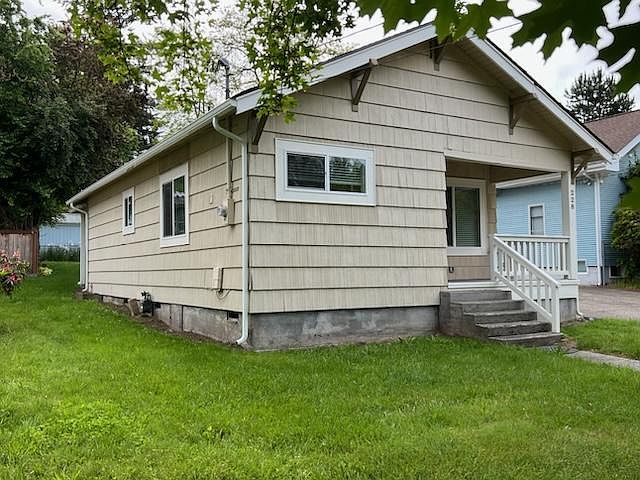 Completely updated vintage charmer on the Eastside with new exterior paint, covered front porch and gas wall heat.