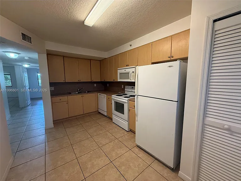 22901 SW 88th Pl #205 — Photo 11
