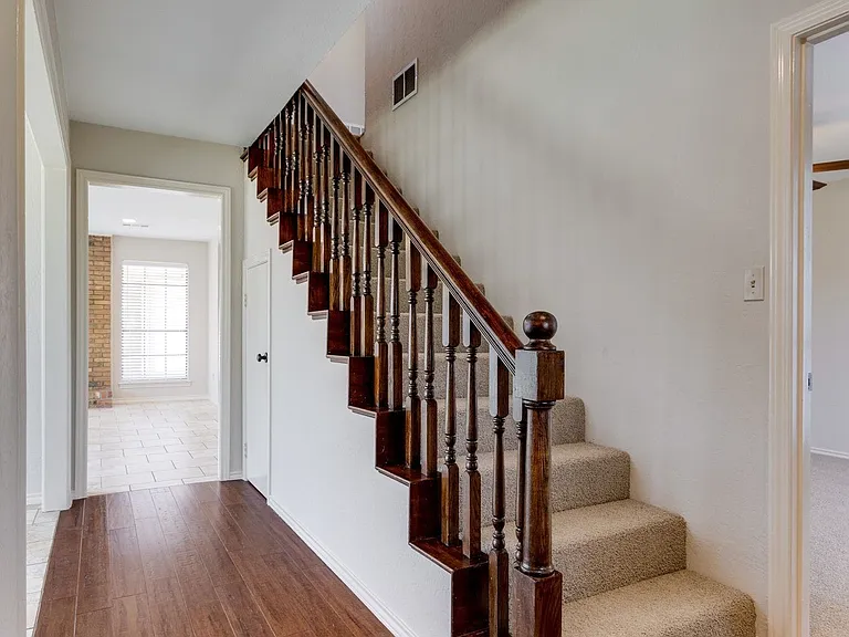 Solid wood floors in the entry hall.
