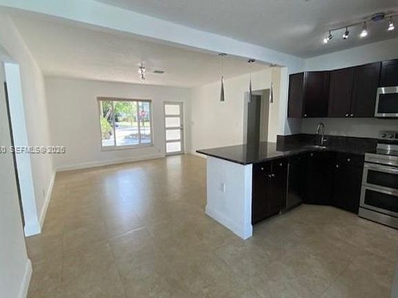 4th image of 5881 SW 15th St