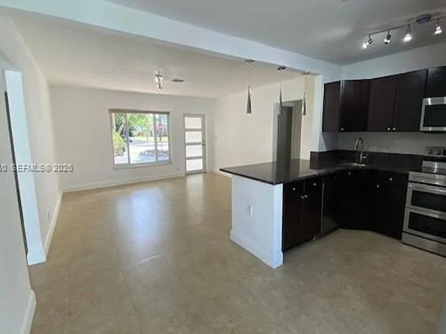 5881 SW 15th St — Photo 5