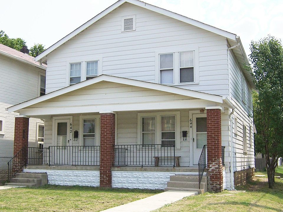 Front view, siding, new roof and sidewalks