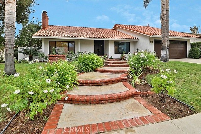 Front of house with 2-car garage
