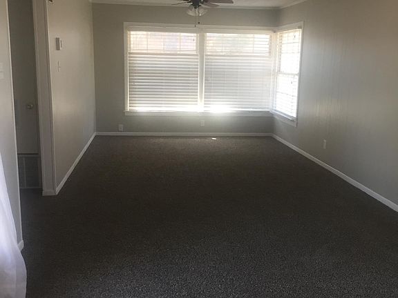 Living room has new carpet and new paint