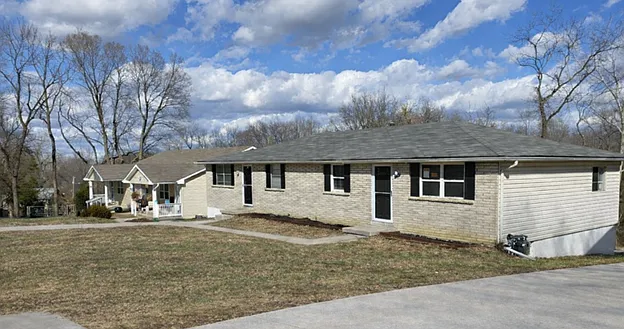 Clean, well-maintained side-by-side duplex with private entry and updated exterior.