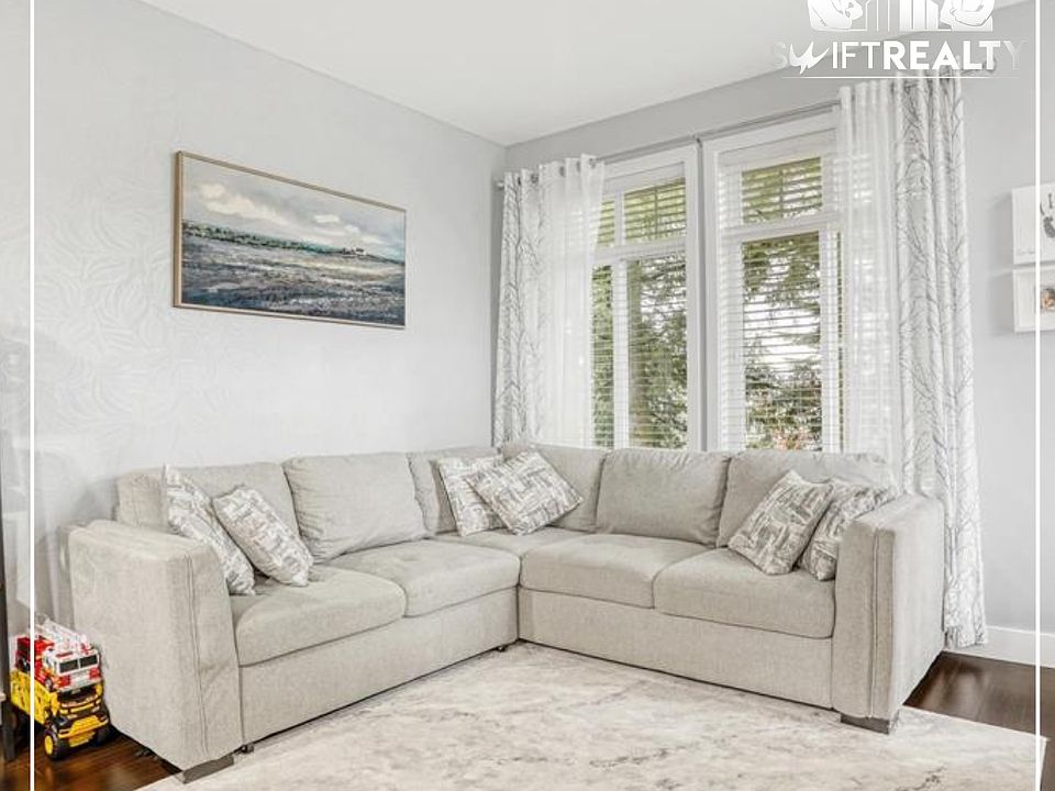 03_102-8251 209B St_Bright Living Room_02202026