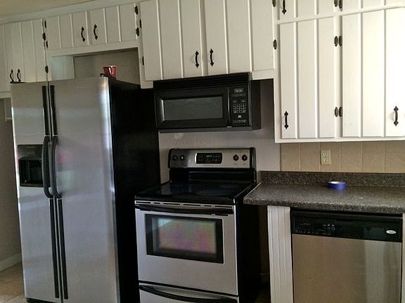 Kitchen includes frig, stove, DW and Microwave