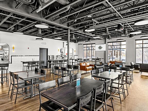 Experience the charm of this stylish community dining space, perfect for gatherings and social events.