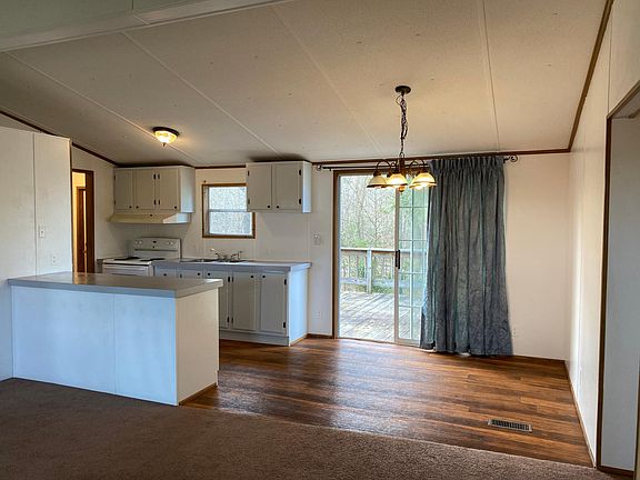 Dining room off the kitchen with beautiful views of the yard