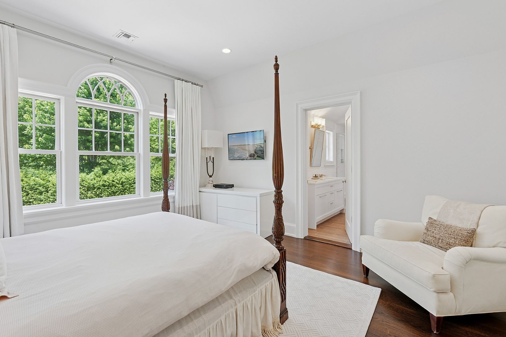 2nd floor bedroom with large windows