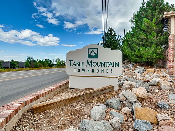 Welcome to the serene Table Mountain Townhomes, where comfort meets nature.