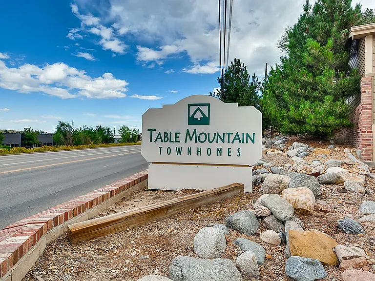 Welcome to the serene Table Mountain Townhomes, where comfort meets nature.