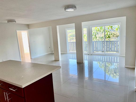 Living Room with Bedrooms (2) on each side.