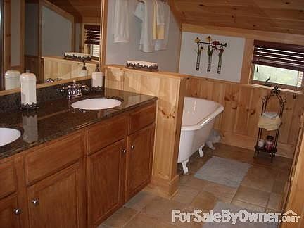 Master Bath (Upstairs)
						:
						Clawfoot tub, standup tile shower, granite tops, tile