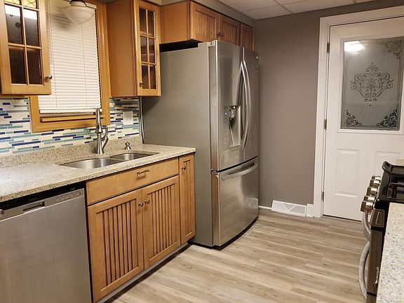 Kitchen w/ recessed lighting and stainless steel appliances