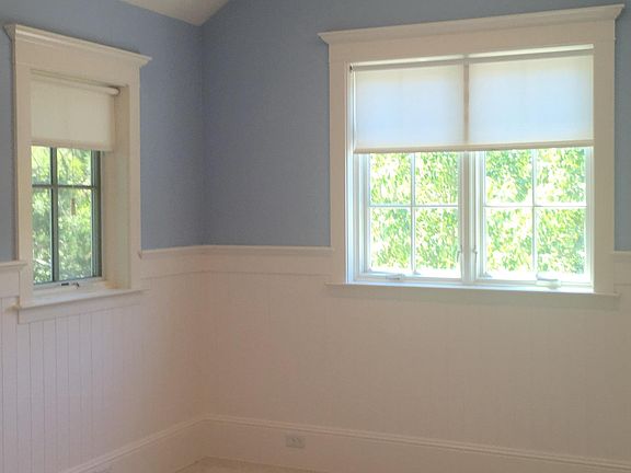 Upstairs bedroom with views to mature oak trees and front garden