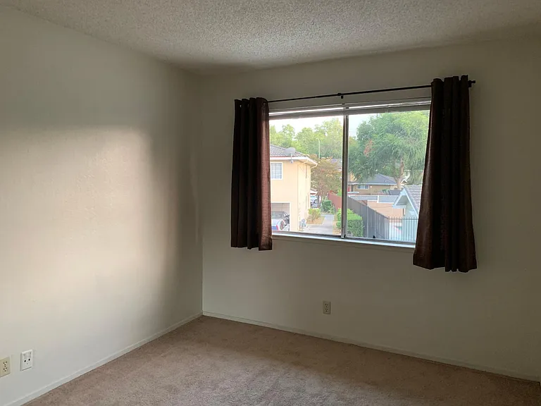 2nd Bedroom (Again I can't get it all in without a wide angle lens)