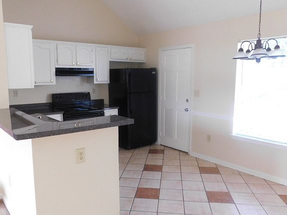 5th image of 7112 Amberly Way Dr