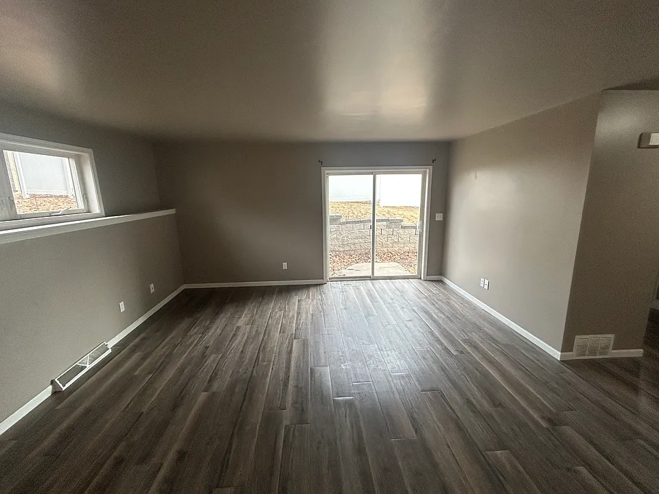 Living room with side patio.