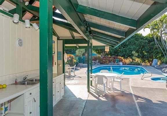 Pool House features gas BBQ, shower, sink & tiled counter