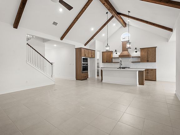 Great room with soaring vaulted ceiling
