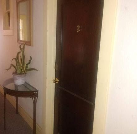 Front door to apartment #3 from hallway