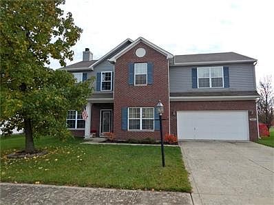 Front view of classic 4 bedroom home. Also includes den and loft. Over 2500 square feet! Looks of brick makes the home stand out among others.