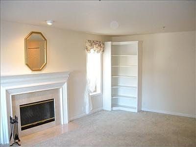 Living Room with built-in corner bookshelves