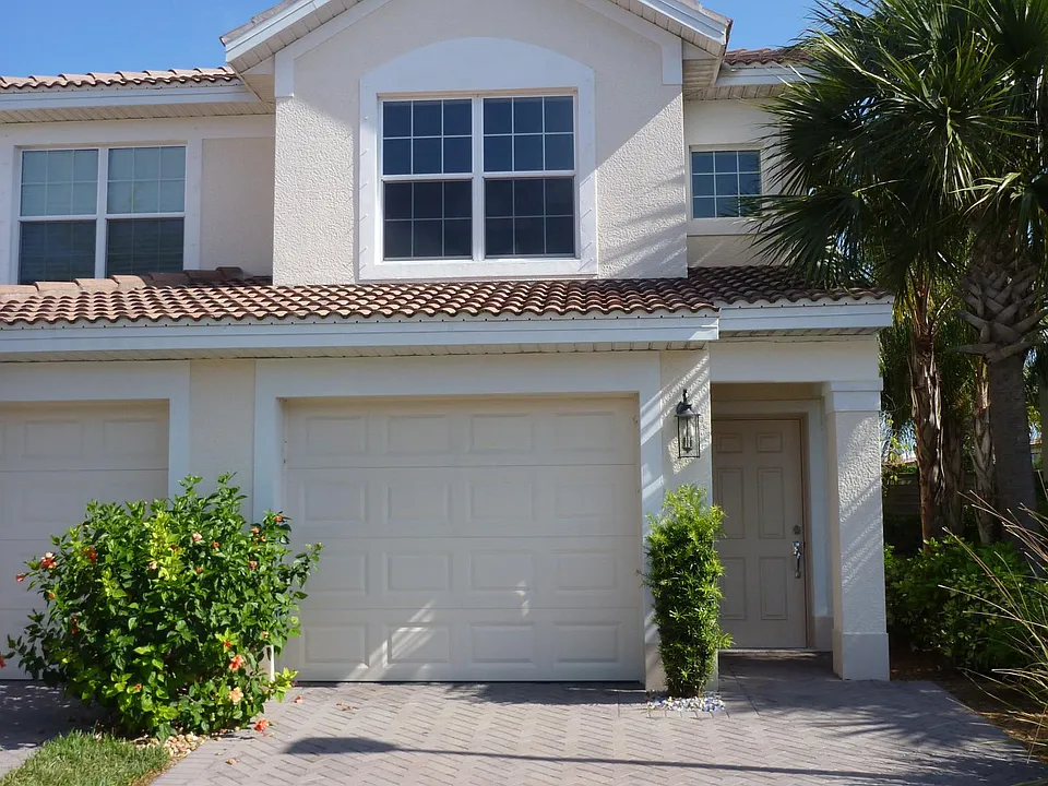 Second Floor Unit with one car garage and private driveway