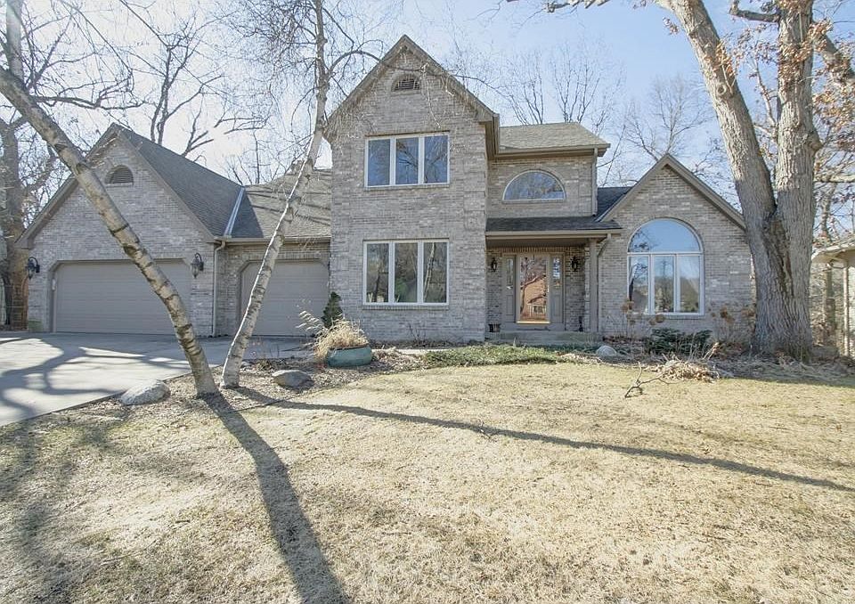 Amazing 2-story on a private lot, in 196-schools. 115' of lakefront and overlooking a small lake, Scout Lake.