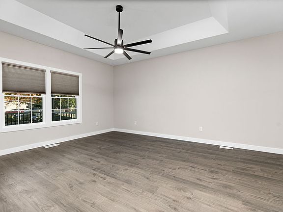 Tray ceiling adds a warm, yet room defining touch.