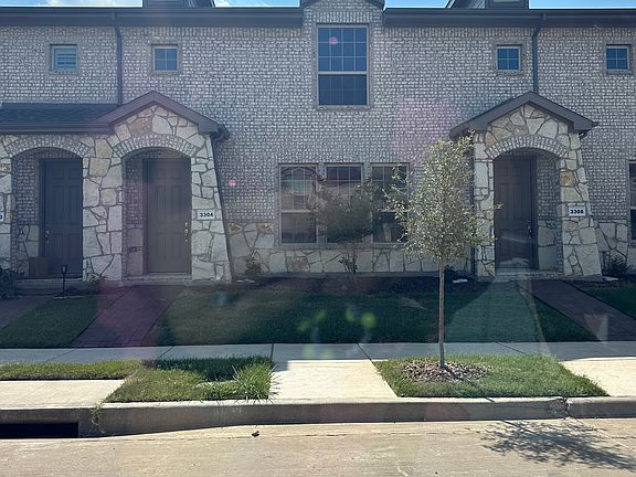 Curb side view with a beautiful sidewalk perfect for those daily walks around the neighborhood