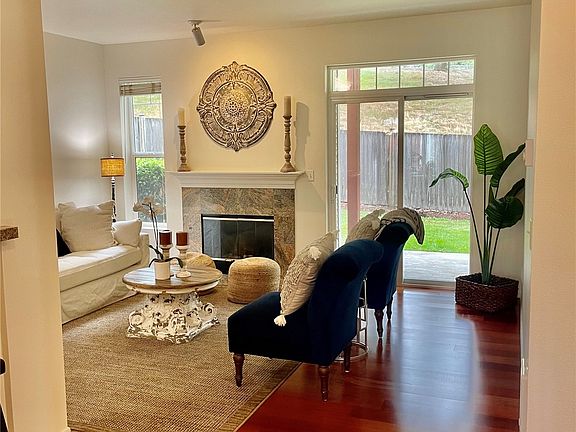 open to the living room with hardwood floors>